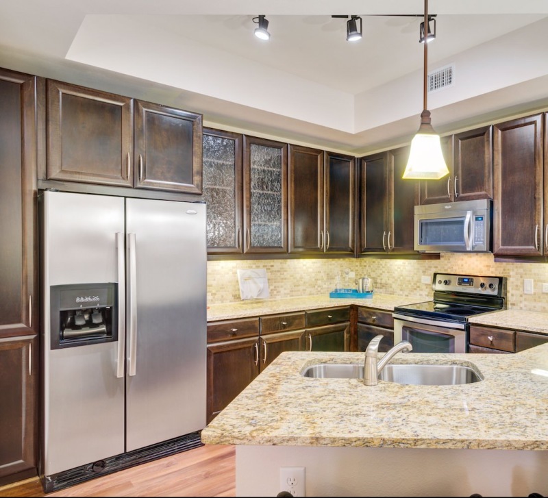 large kitchen with wood floors 