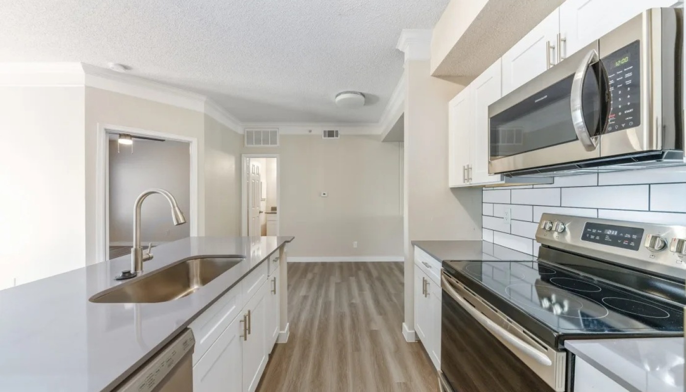 large kitchen with wood floors 