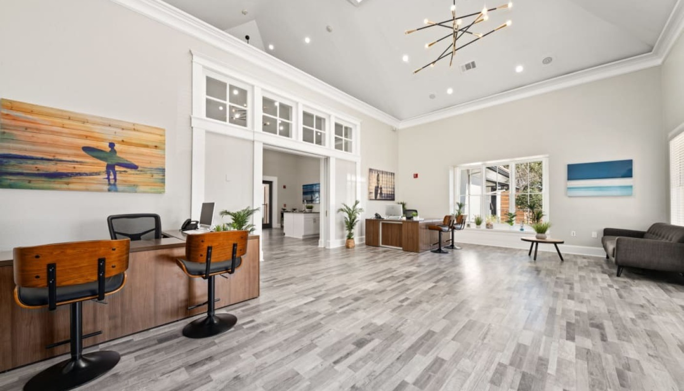 Lounge area with wood floors and bar seating