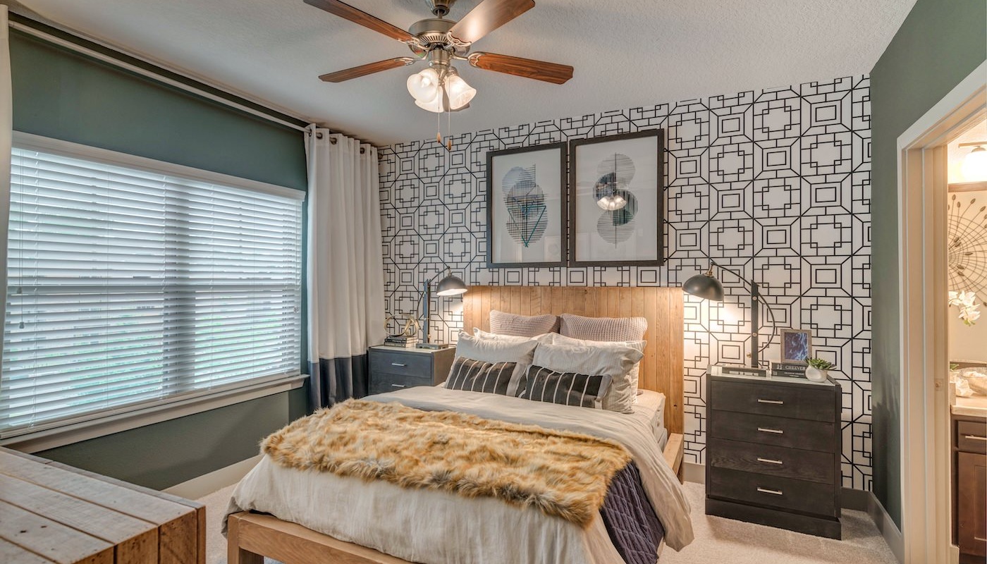 Spacious bedroom with large window