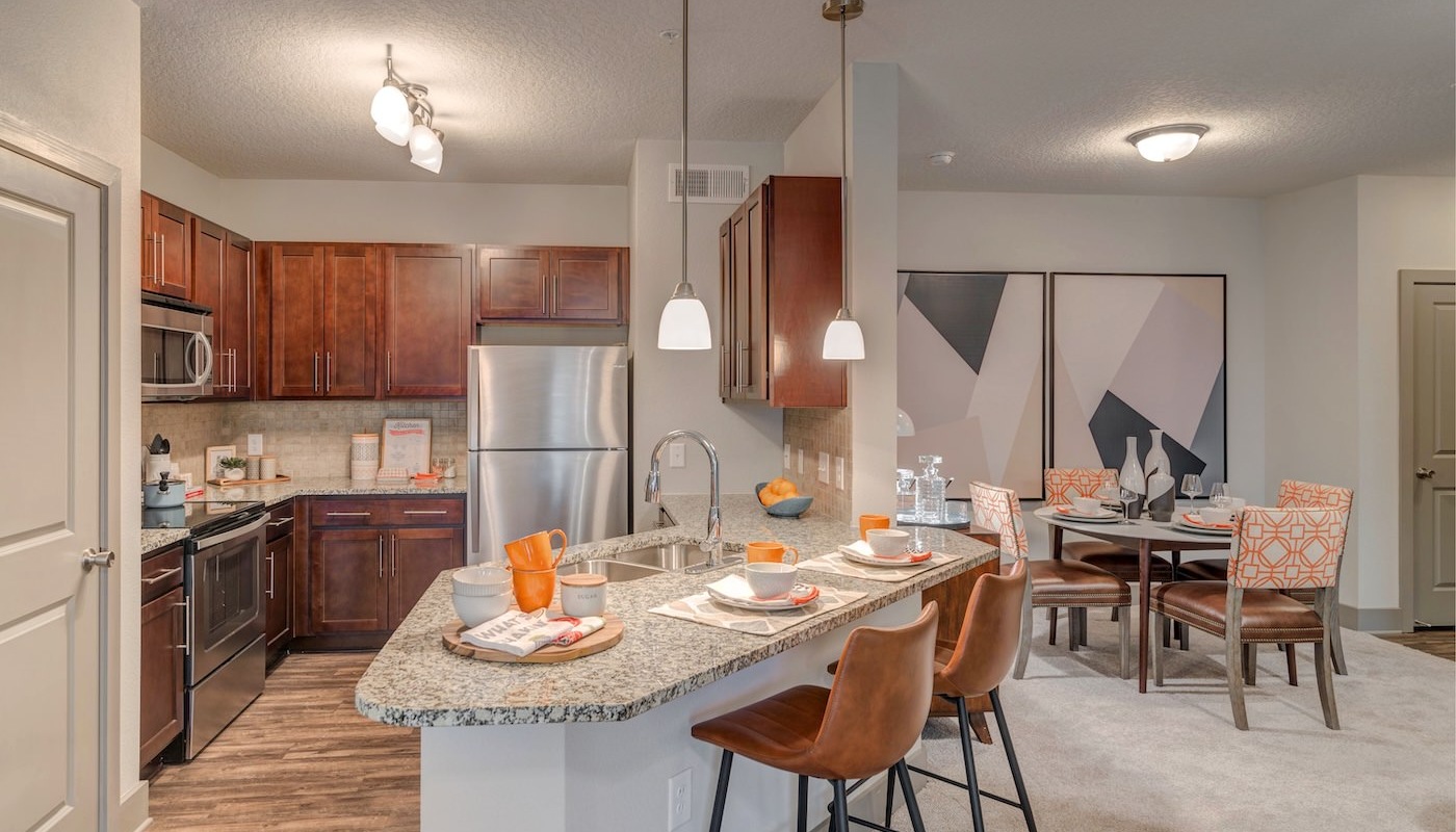 large kitchen with wood floors 