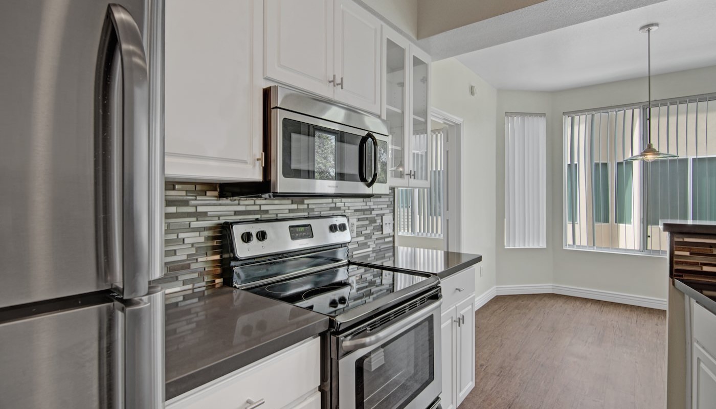 large kitchen with wood floors 